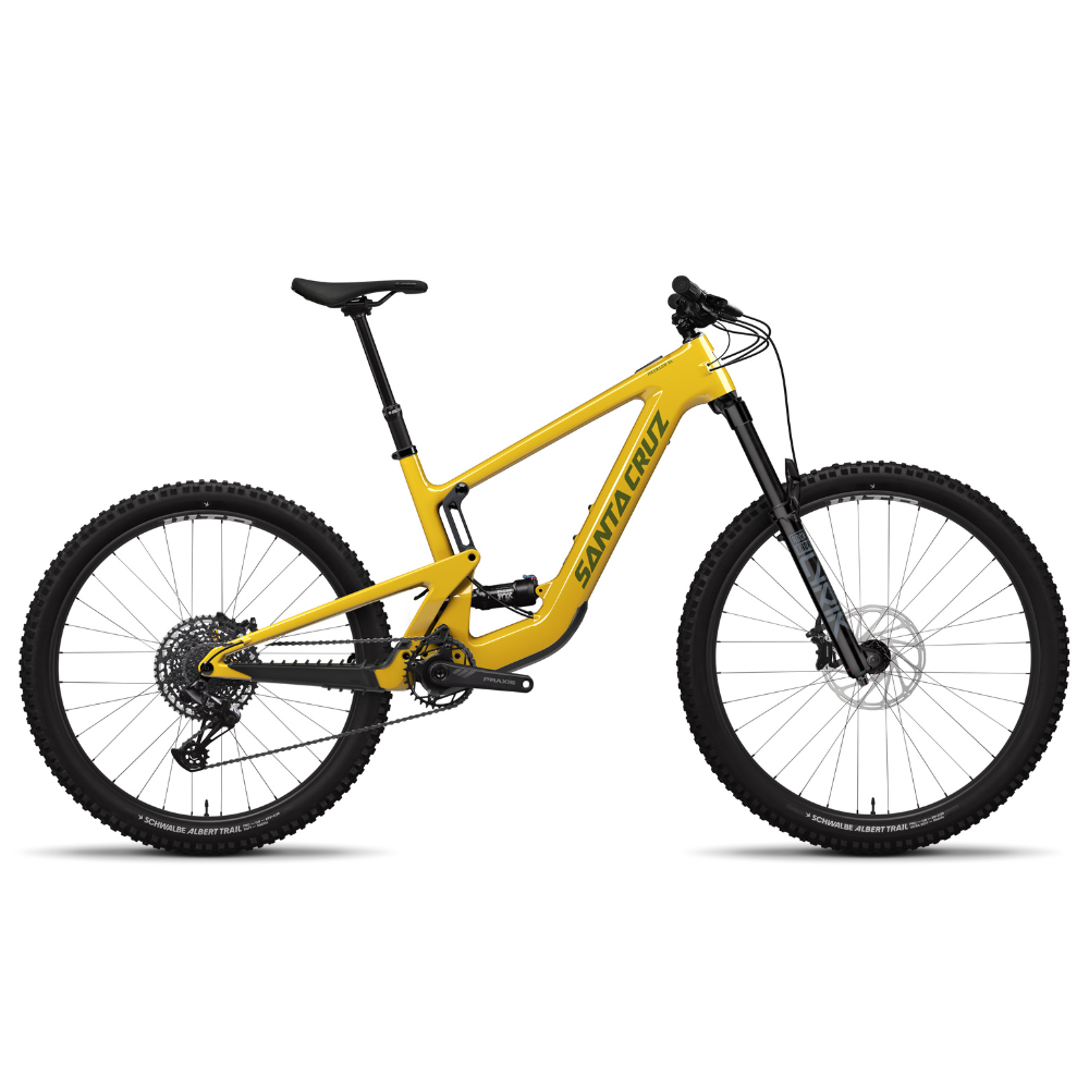 Bicicleta Santa Cruz Heckler SL amarilla en vista lateral completa sobre fondo blanco.