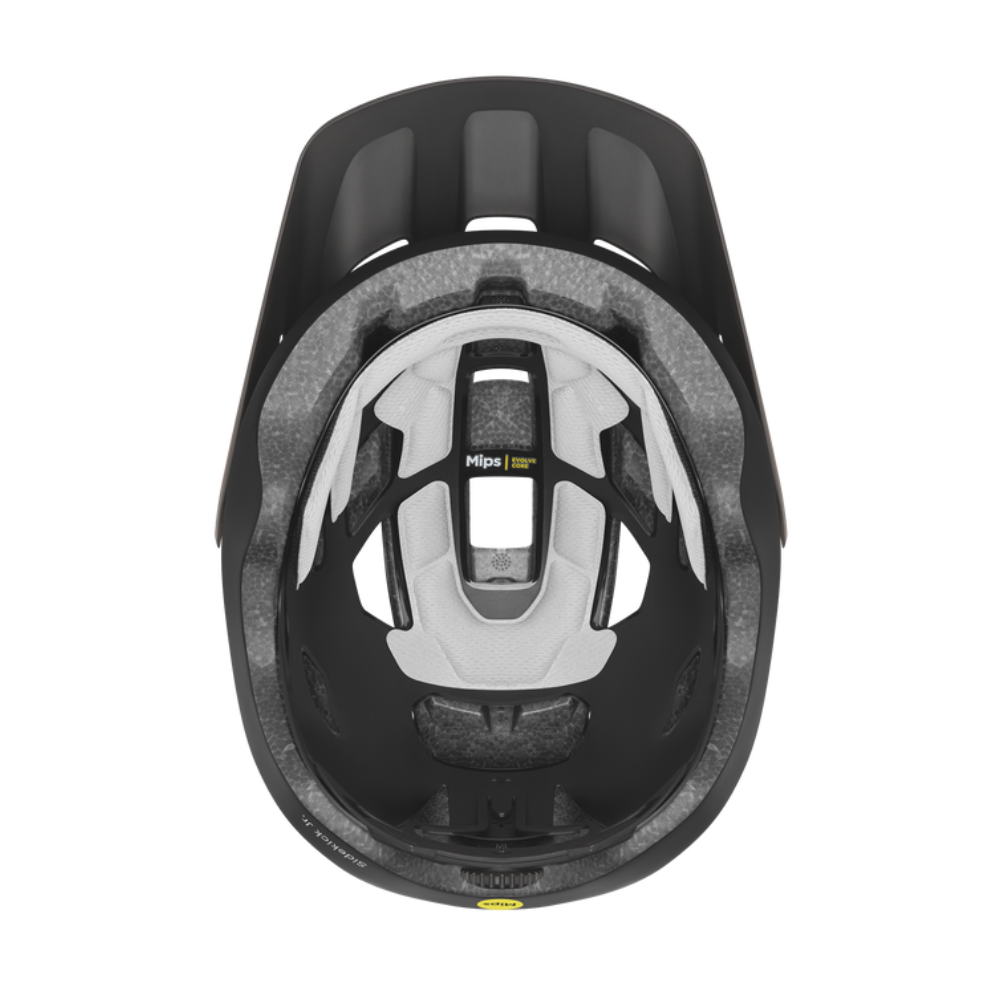 Interior del casco infantil Smith Sidekick Jr Matte Black con sistema Mips, acolchado y dial de ajuste sobre fondo blanco