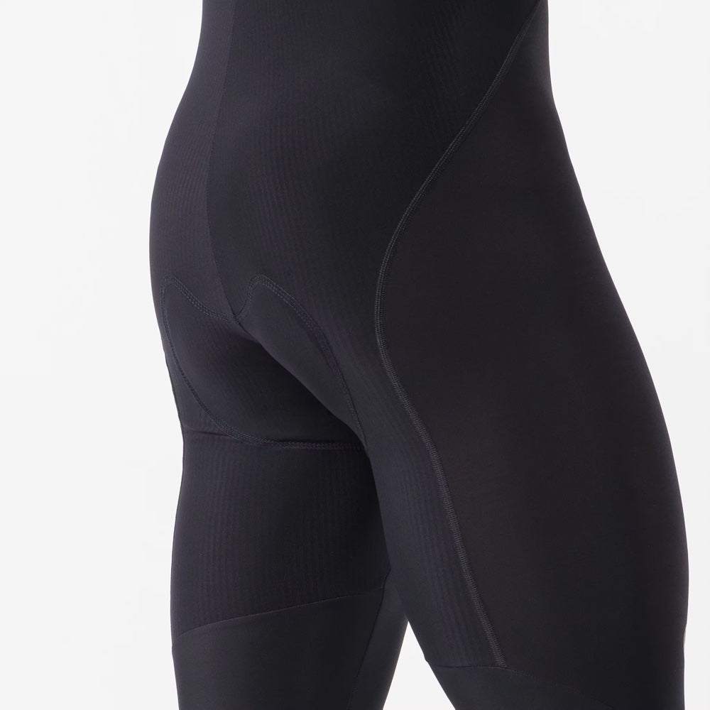 Pantalón Castelli Competizione Bibtight negro, detalle frontal de los paneles y costuras de la rodilla.